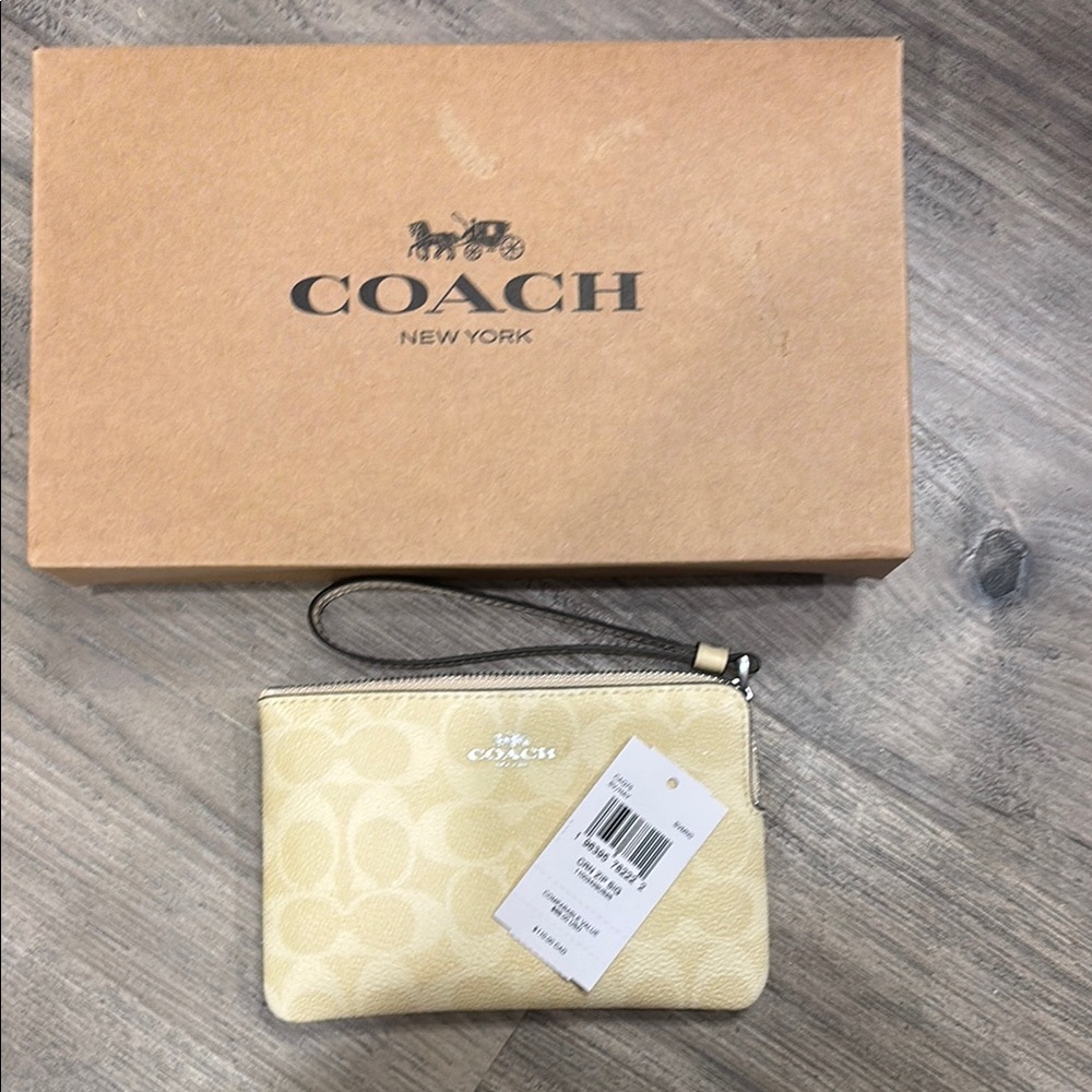 Tan coach wristlet
